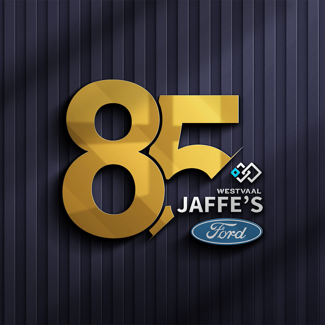Bold golden "85'th" anniversary emblem with Westvaal Jaffe's Ford dealership branding and official Ford logo on dark textured wall mockup